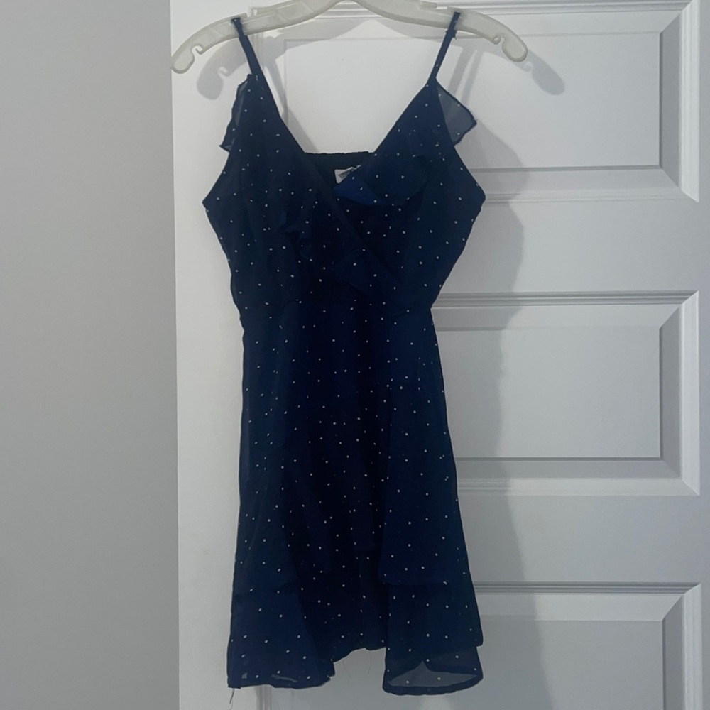 Navy blue with white polkadots romper
